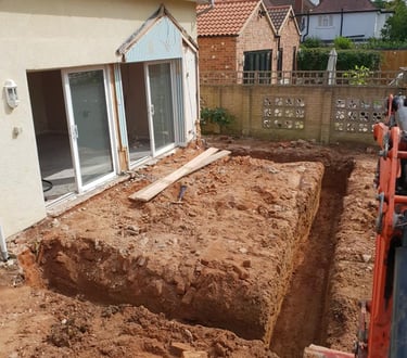 Foundation excavation underway in Birmingham building site