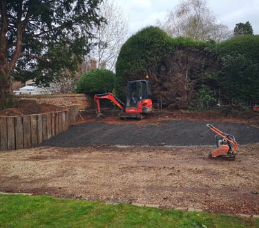 digger and whacker plate in an oldbury garden