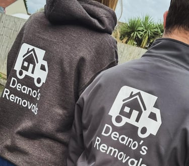 2 deanos removals workers in company jumpers