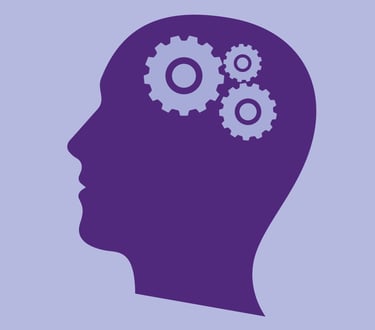 Silueta de una cabeza con tres engranajes