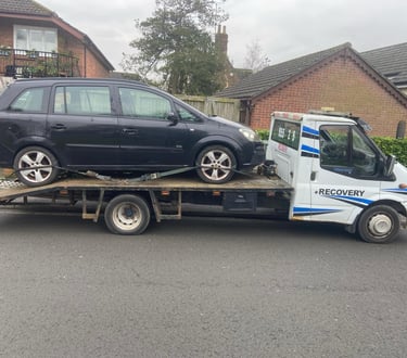 alt="Car recovery and transport truck in action near Worcester"