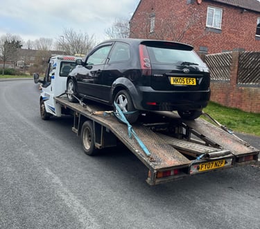 alt="Scrap car being collected from driveway in Bengeworth, Evesham"