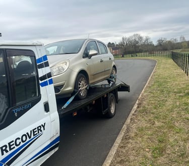 alt="Scrap car being collected in Primsland, Droitwich"