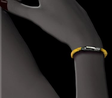 Handmade yellow fish leather bracelet worn on a wrist.