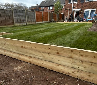 Raised timber sleeper wall in Worcester garden