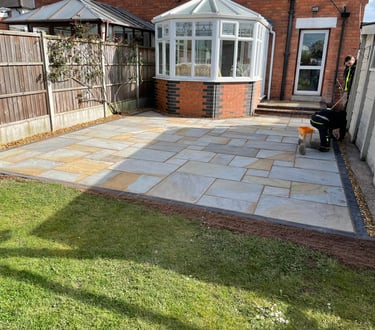 Outdoor seating area with new patio in Worcester