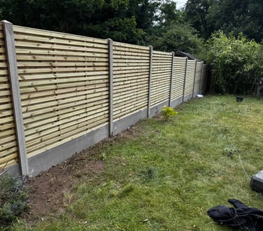 Wooden fence panels and concrete posts in Worcester