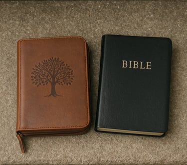 Two Bibles sitting on a stone platform