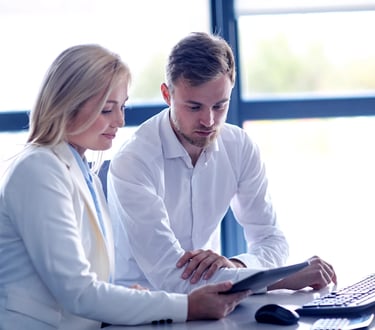 staff showing tablet