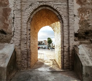 View through stone arch in Taroudant walls, stop on Agadir to M'hamid trip