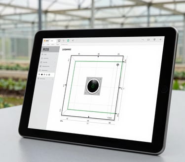 A sleek autonomous agricultural robot navigating through a greenhouse row.