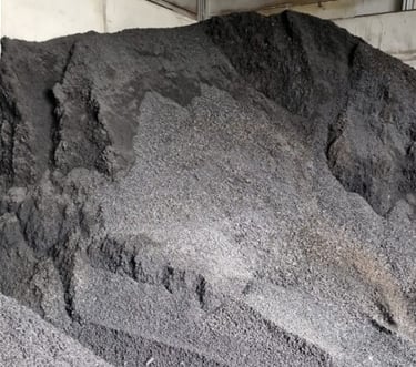 A large pile of fresh biochar