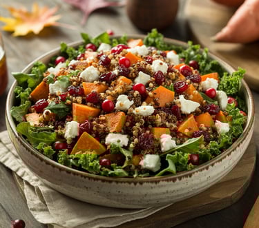 a bowl of salad with a wooden spoon and a wooden spoon