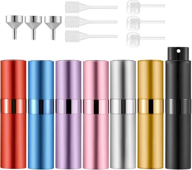 a variety of different colored bottles of different colors