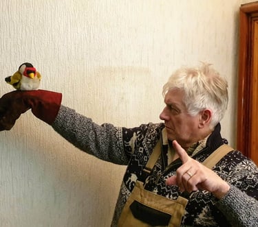 Gilbert Summers doing something very silly by way of a change from painting.