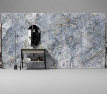 Modern bathroom vanity featuring a blue marble wall slab, oval mirror, and sleek black console table.