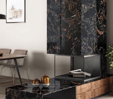 a living room with a black marble coffee table