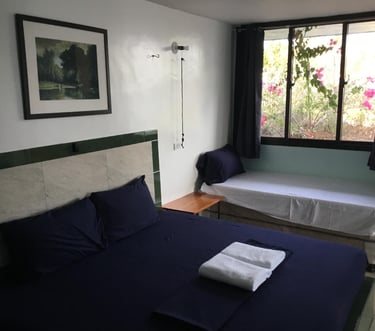 King bed in Callachuchi Homestay bungalow