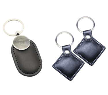 Jetons RFID en cuir de couleur noir et de formes losange et ovale pour serrure d'établissement hôtelier.
