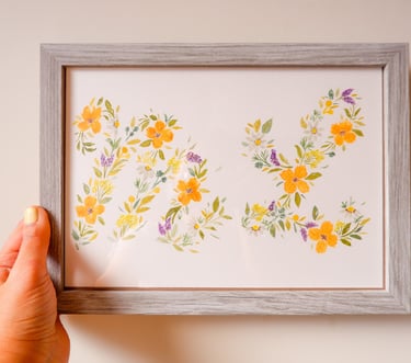 Framed watercolor floral painting of initials by NYC live event artist Handwritten by Belle.