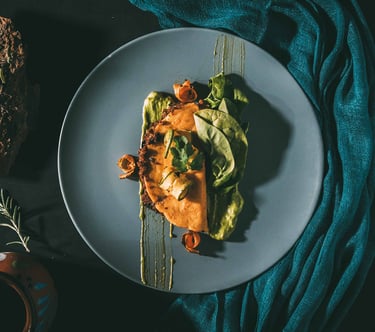 a plate of food with a taco on it