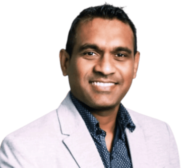 Ranil Fernando, Mortgage Agent Level 2 at MortgageWell Ontario, navy shirt and grey blazer smiling