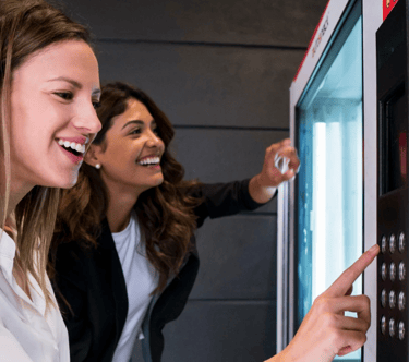 Happy employees enjoying vending machines - Bill's Vending Solutions in Columbia, South Carolina