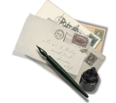 Old envelopes with old stamps, calligraphy pen and bottle ink