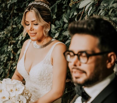 Wedding photography in London – bride and groom sitting with bouquet by Fred Art Studio.