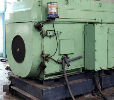 Automatic grease lubrication unit installed on steel plant equipment bearing