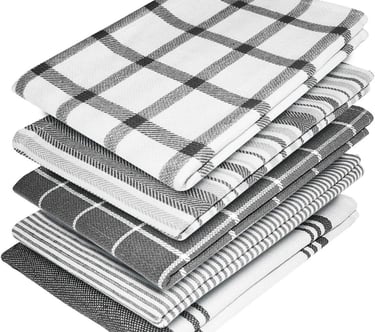 a stack of four different types of kitchen towels
