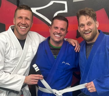 RebelFire MMA coaches and BJJ students in Gi at the Langley gym