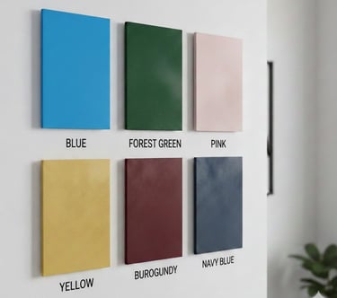 Six textured colorful leather swatches mounted on a white wall for interior design inspiration.