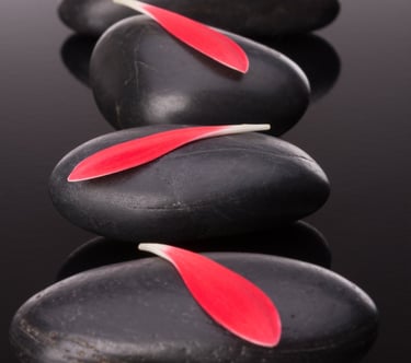 Relaxing Hot Stone full body massage at Studio 9, the best unisex spa in Ambattur Chennai