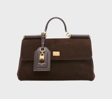 This My Sicily top handle bag from Dolce&Gabbana is crafted of soft suede and features a removable
