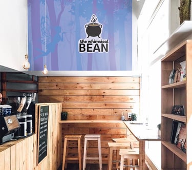 Coffee shop with custom logo wall design