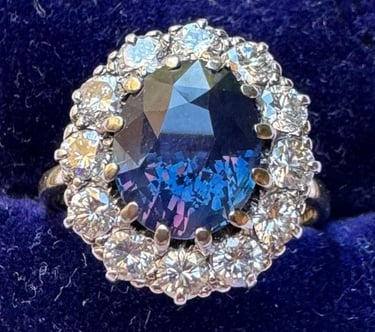 4 carat colour change Ceylon sapphire & diamond cluster ring