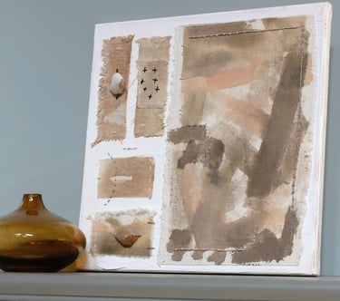 Abstract painting on canvas in earthy brown and beige tones, with textured fabric and soft brush strokes and natural agates