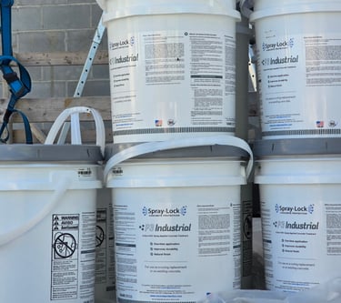 5 Gal pails of P3 Industrial stacked for use on a construction site concrete treatment