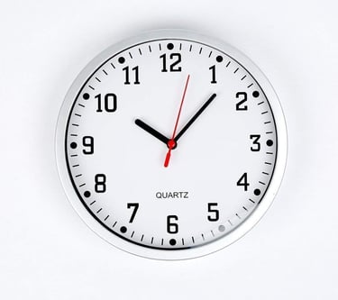 a clock with a red and white clock face