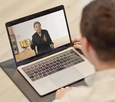 learner is watching Dr Robert Cialdini Certified Influence Practitioner course on a laptop