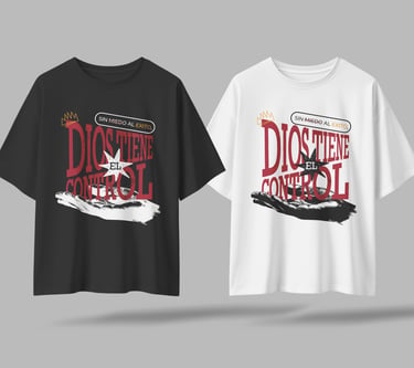 Black and white oversized graphic t-shirts featuring the Spanish religious text Dios Tiene El Control.