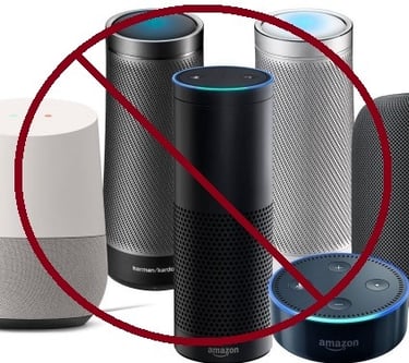 Various industry leading Home Assistants(Siri, Alexa, Google Home) depicted with a prohibitory sign.