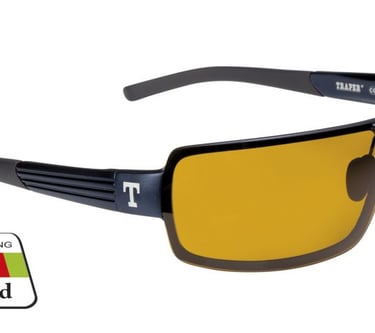 Traper magnesium polarized fishing sunglasses with glare-blocking amber lenses and black frames.