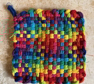 rainbow colored homemade pot holder