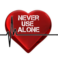 red heart with never use alone white text in the middle