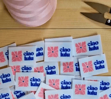 a bunch of stickers that are sitting on a table