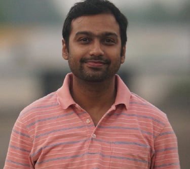 a man in a pink shirt and a pink shirt