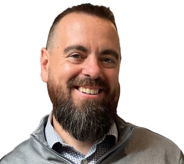 Kevin Gillis, principal mortgage broker and owner at MortgageWell Cornwall, wearing a grey pullover 