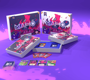 Caja con contenido de Maho, juego de mesa de construcción de mazos para 2 a 4 jugadores